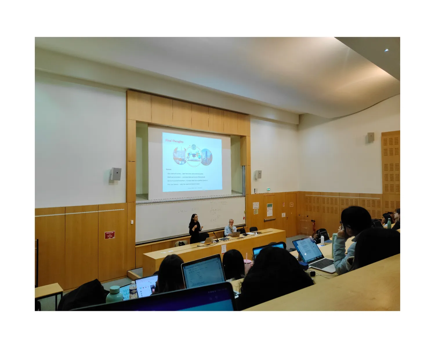 Lecture hall presentation with a 'Final Thoughts' slide