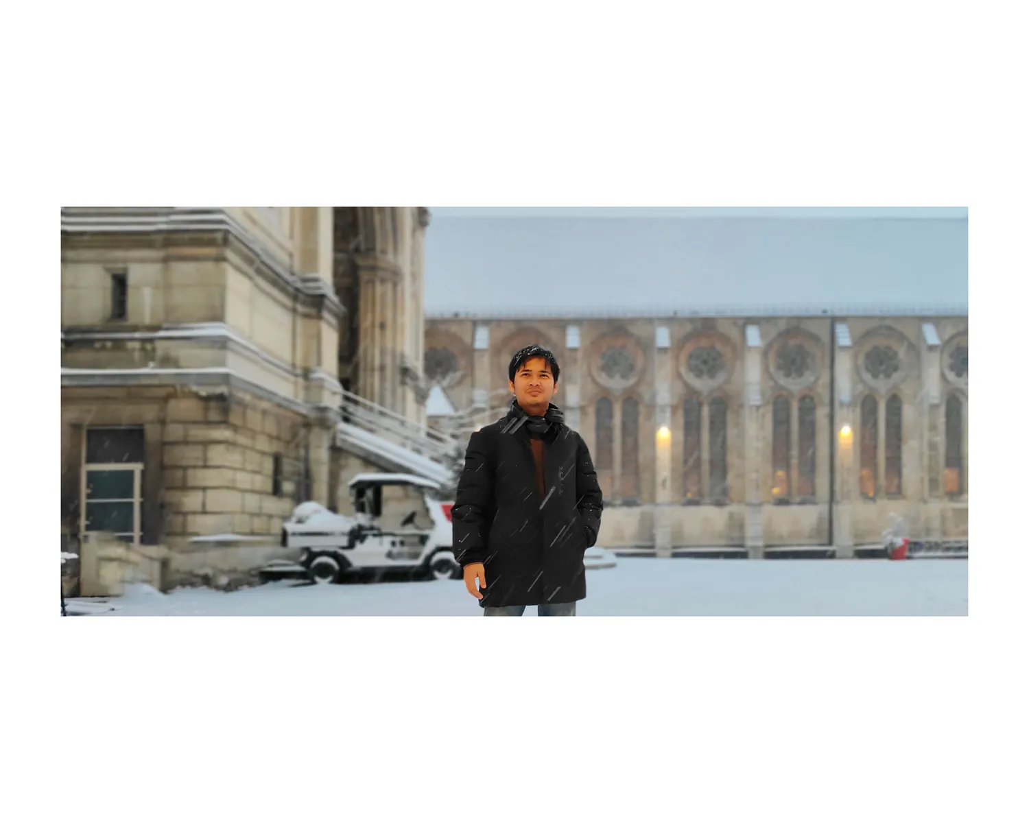 Snow-covered courtyard of a historic Paris building